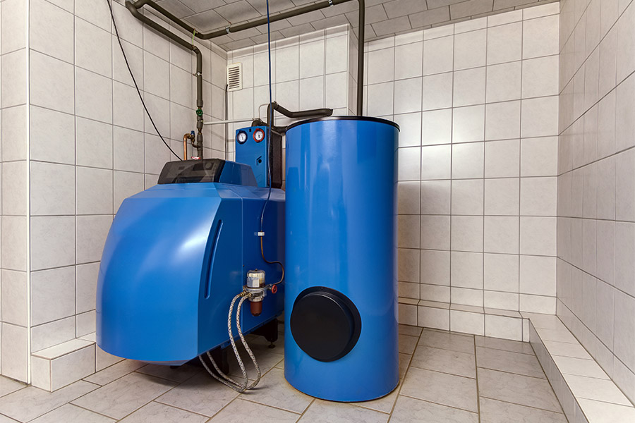 boiler room with blue oil burner