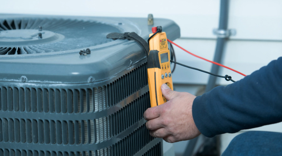 technician giving maintenance to a hvac system milford nh